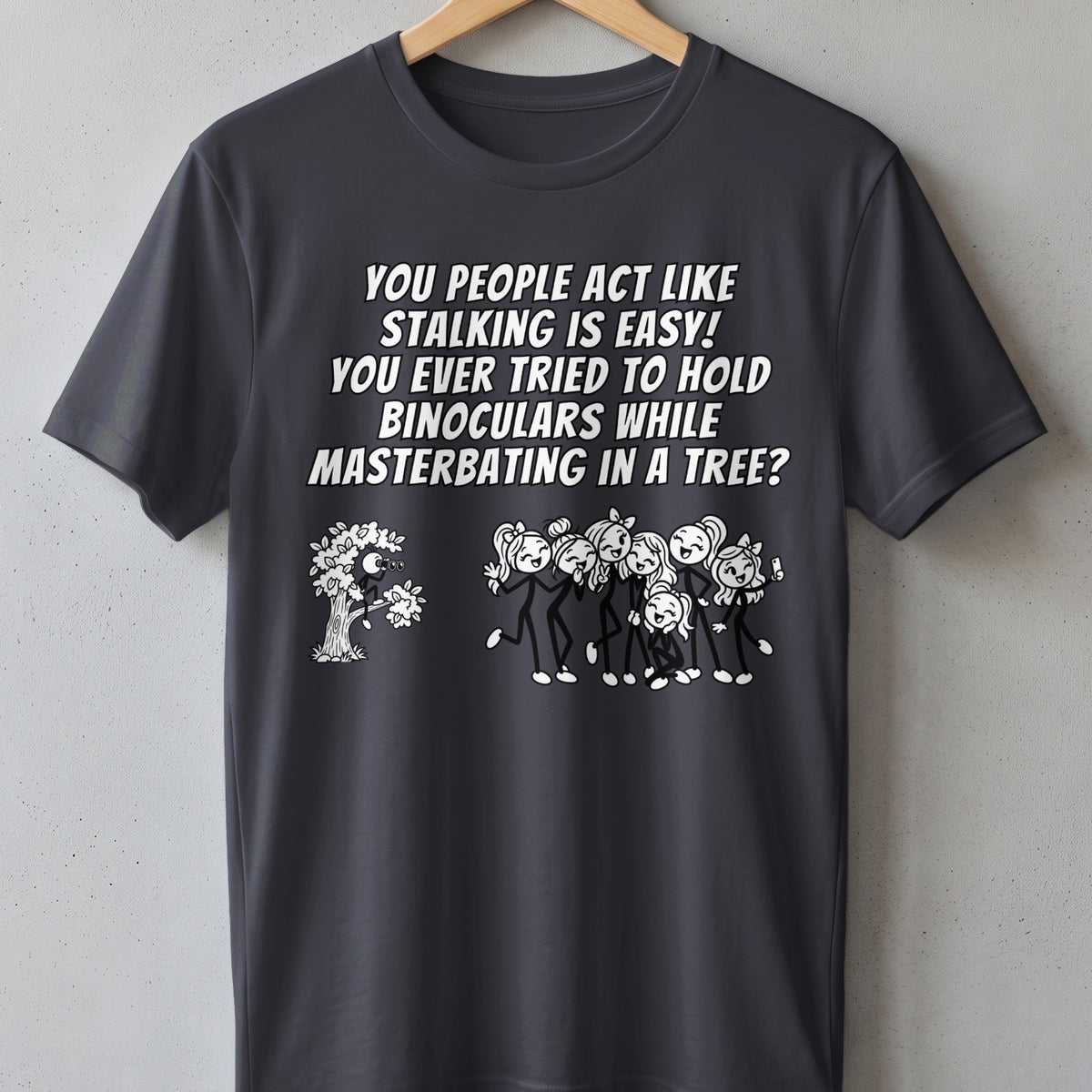 T-shirt with text about stalking and a stick figure in a tree with binoculars.