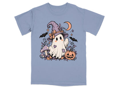 Ghost in witch hat with moon, mushrooms, bats, and pumpkin on blue t-shirt.