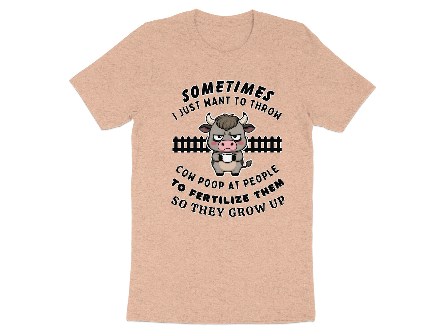 Peach t-shirt with a grumpy cow holding a mug and text about cow poop.
