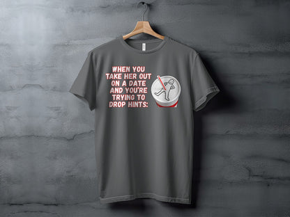 Dark gray t-shirt with text and a graphic of a person in a drink.