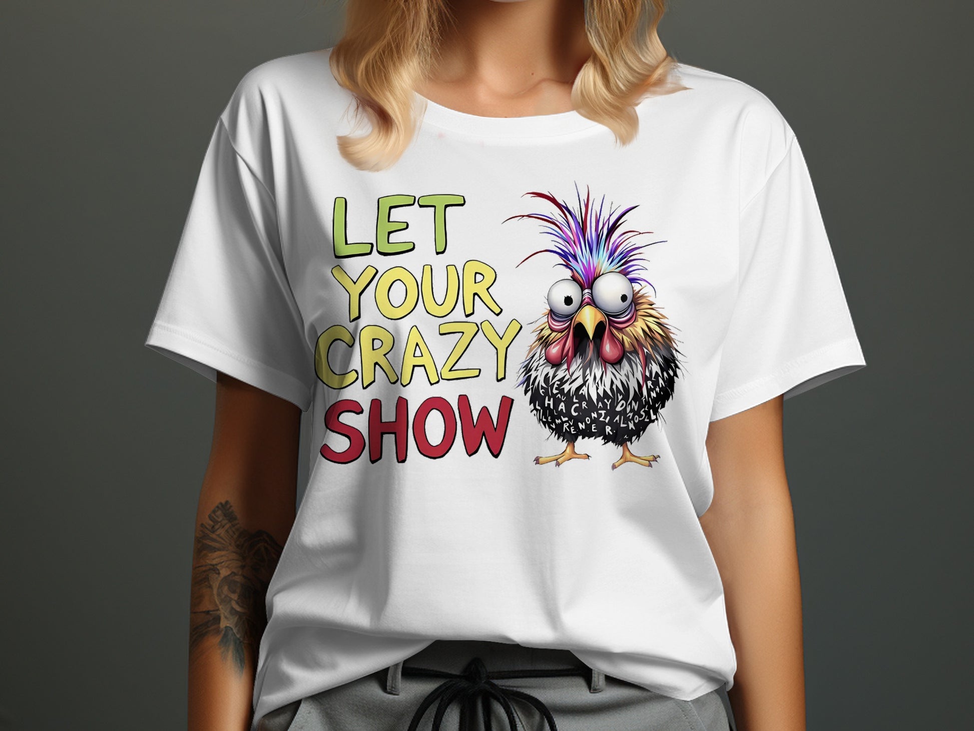 White t-shirt with "LET YOUR CRAZY SHOW" text and a cartoon chicken.