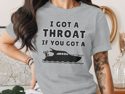 Grey t-shirt with "I GOT A THROAT IF YOU GOT A" text and boat graphic.