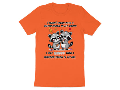 Orange t-shirt with raccoons and text "I wasn't born with a silver spoon in my mouth."