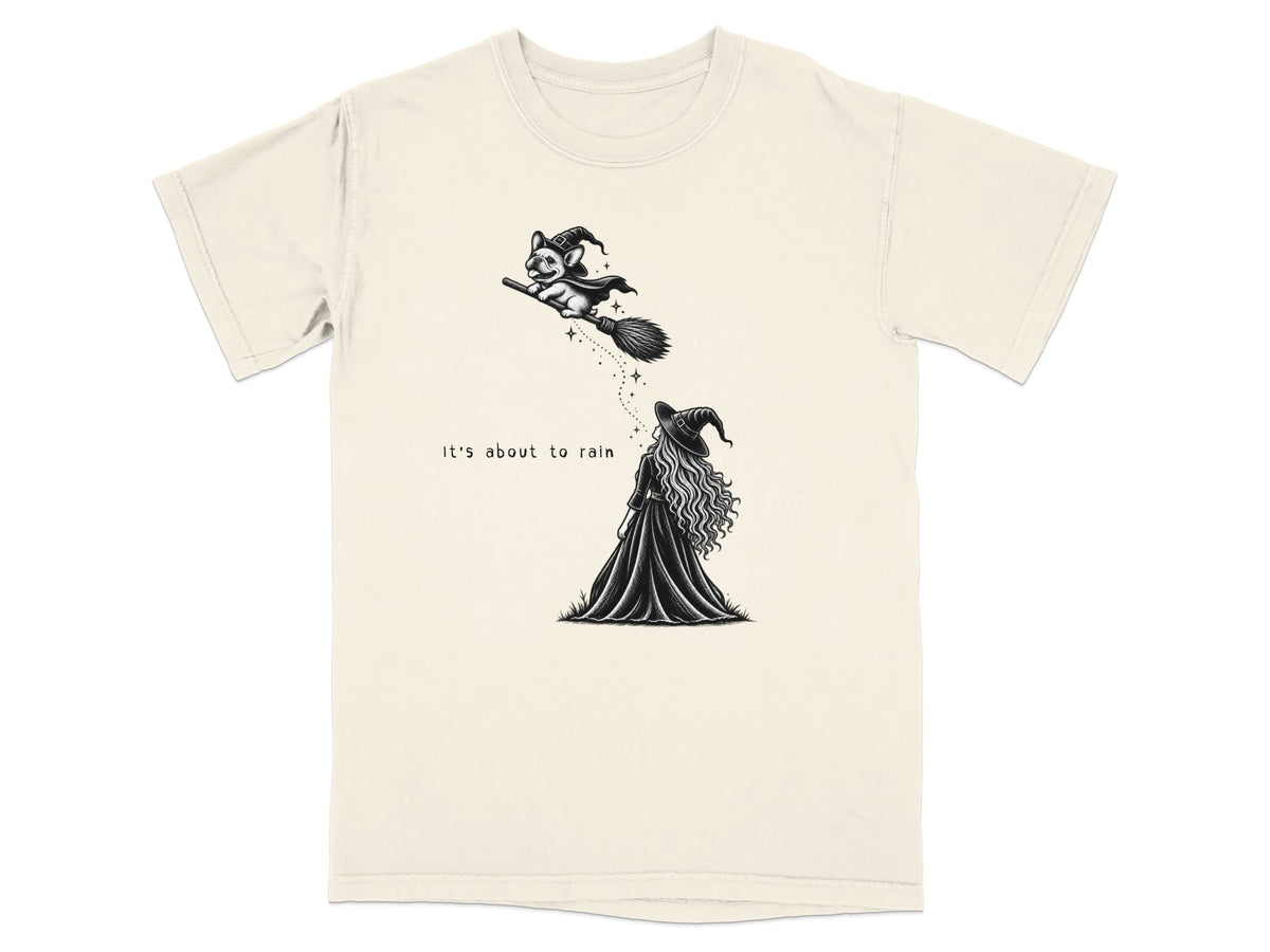 French bulldog witch flies broomstick over witch, text "It's about to rain."