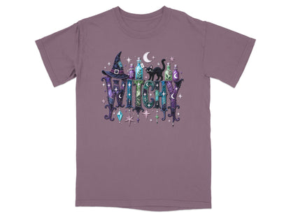 Purple t-shirt with the word "WITCHY" decorated with a witch hat, bottles, black cat, and stars.
