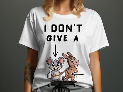 White t-shirt with text "I DON'T GIVE A" above a cartoon mouse leading a donkey.