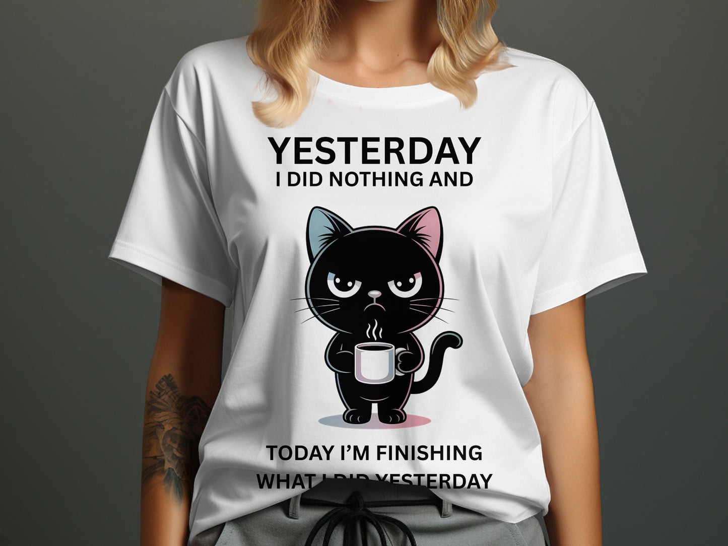 White t-shirt with black text and a cartoon black cat holding a coffee mug.
