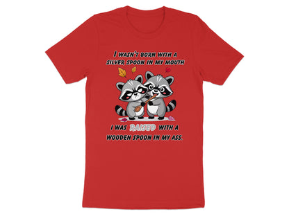 Two raccoons hold a wooden spoon; text reads "I wasn't born with a silver spoon in my mouth."