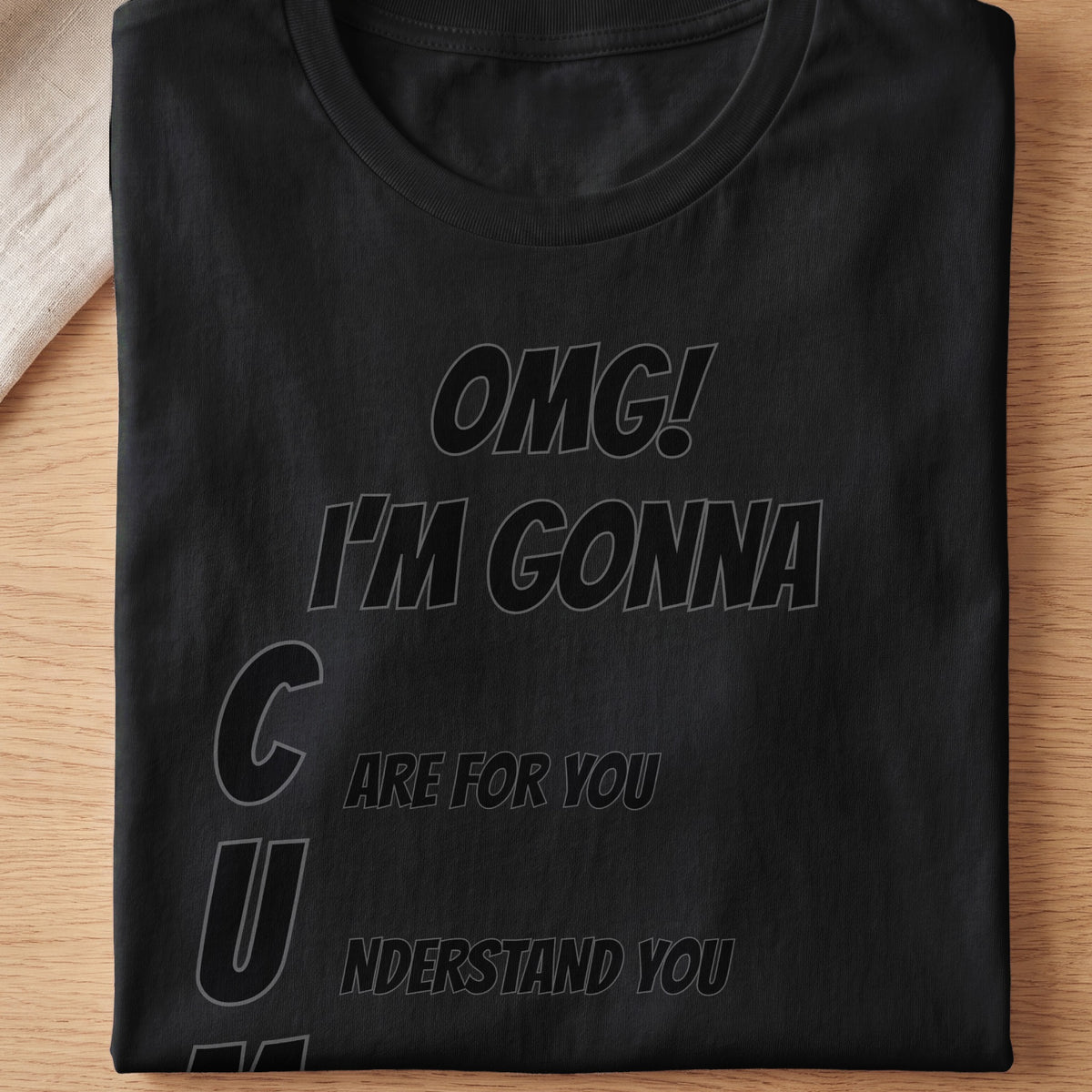 Black t-shirt with gray text "OMG! I'M GONNA C U ARE FOR YOU nderstand YOU".