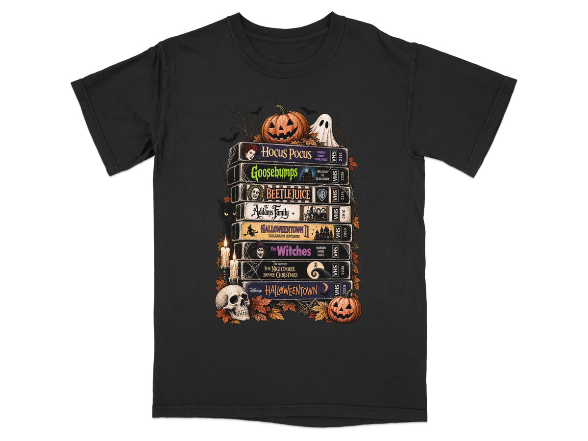 Stack of VHS tapes featuring Hocus Pocus, Goosebumps, Beetlejuice, and Halloween Town.