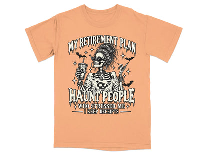 Orange t-shirt with skeleton graphic and text "My Retirement Plan Haunt People Who Stressed Me I Keep Receipts".