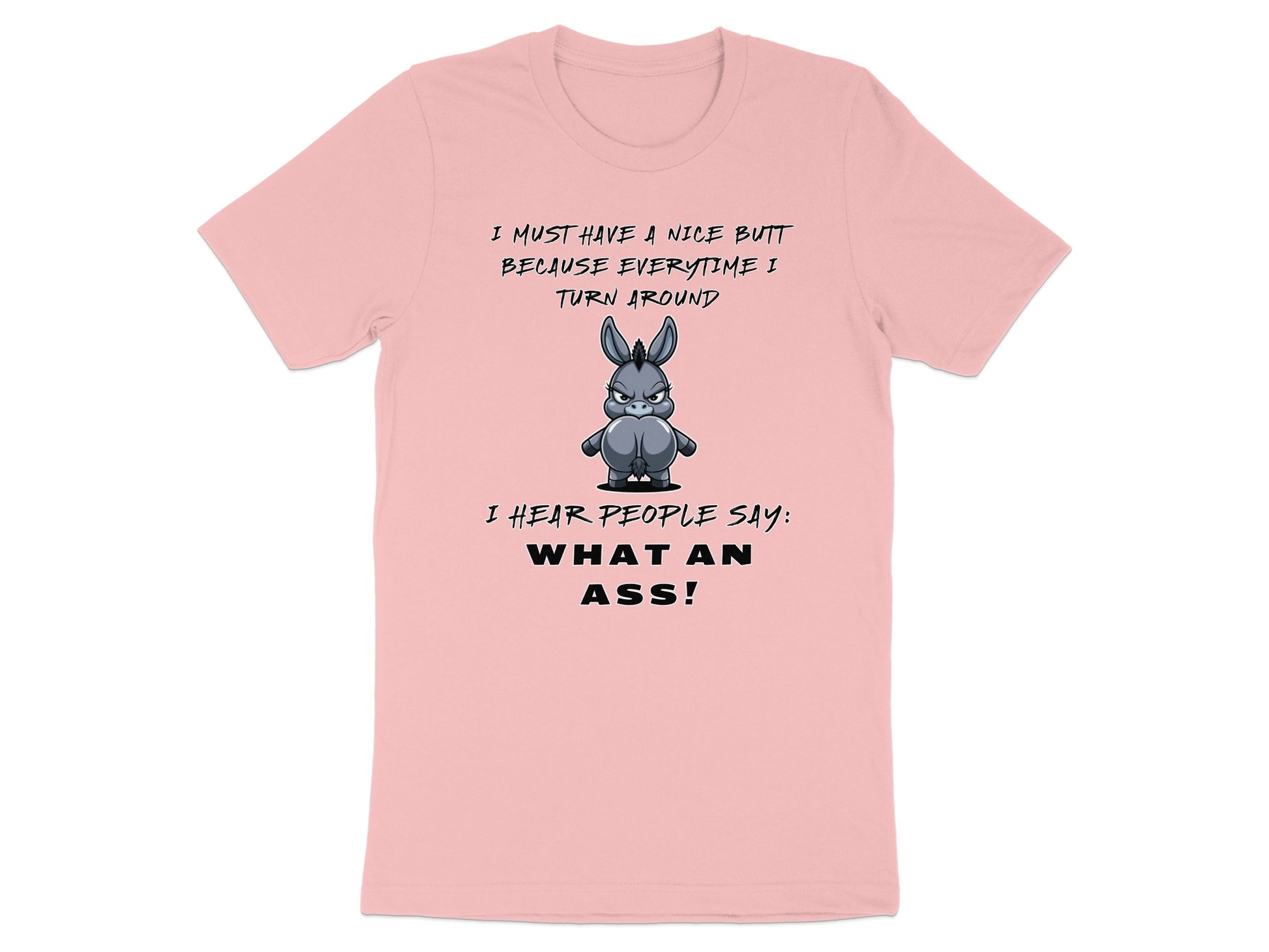 Pink t-shirt with cartoon donkey and text: "I MUST HAVE A NICE BUTT BECAUSE EVERYTIME I TURN AROUND I HEAR PEOPLE SAY: WHAT AN ASS!"