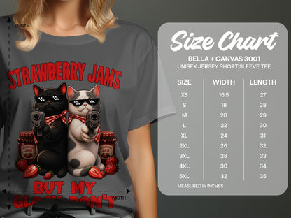T-shirt with two cats holding guns, strawberry jam jars, and text "STRAWBERRY JAMS".
