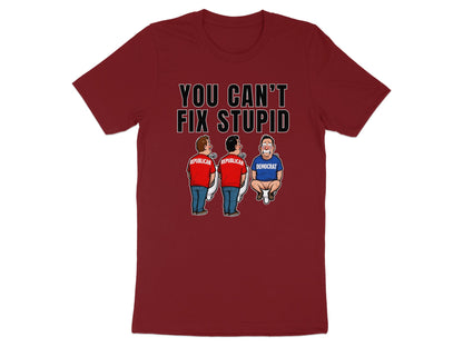 Maroon t-shirt with "YOU CAN'T FIX STUPID" and cartoon of two Republicans and one Democrat on toilets.