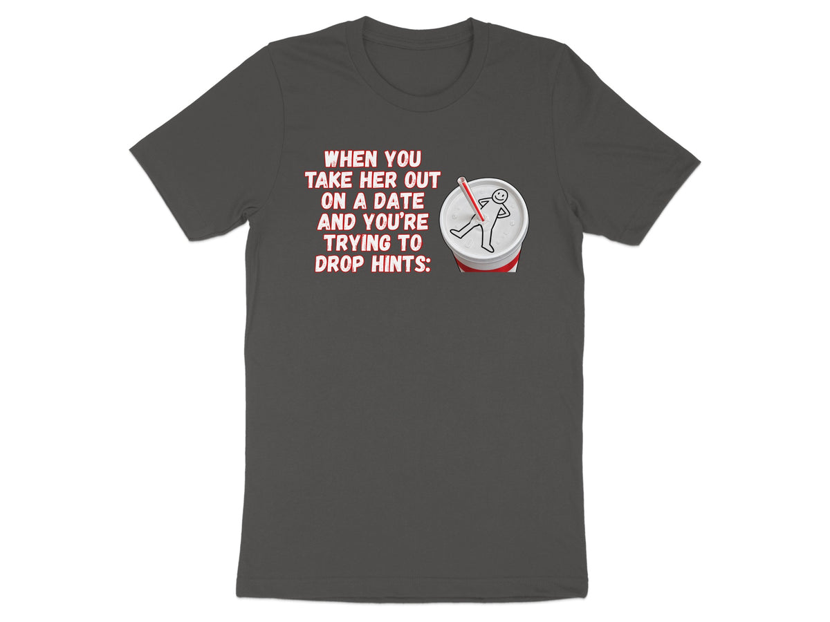 Dark t-shirt with text "When you take her out on a date and you're trying to drop hints:" and a drawing.