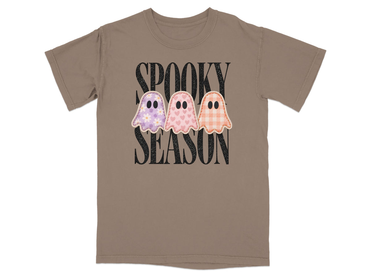 Brown t-shirt with "SPOOKY SEASON" text and three cartoon ghosts.