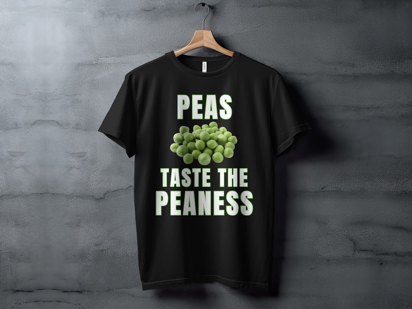 Black t-shirt with "PEAS TASTE THE PEANESS" text and a pile of peas.
