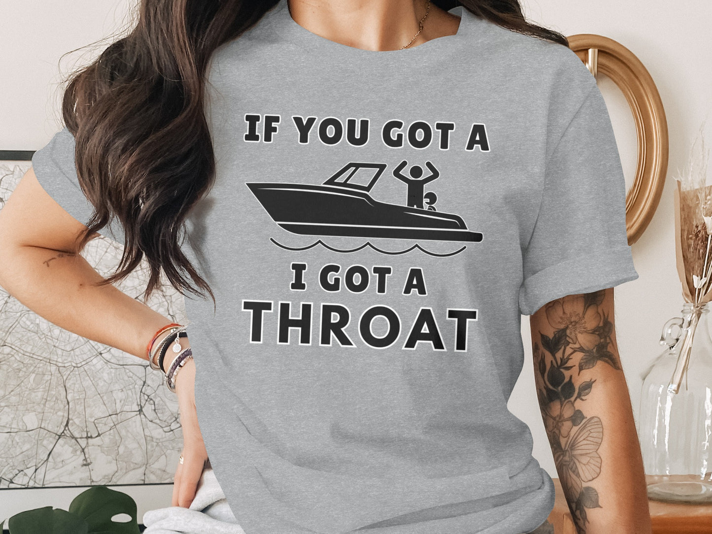 Grey t-shirt with black text "IF YOU GOT A I GOT A THROAT" and boat graphic.