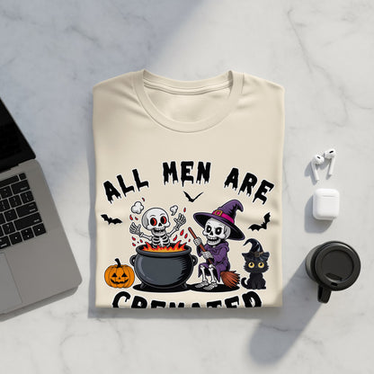 T-shirt graphic with skeletons, black cat, pumpkin, and text "ALL MEN ARE CREATED".