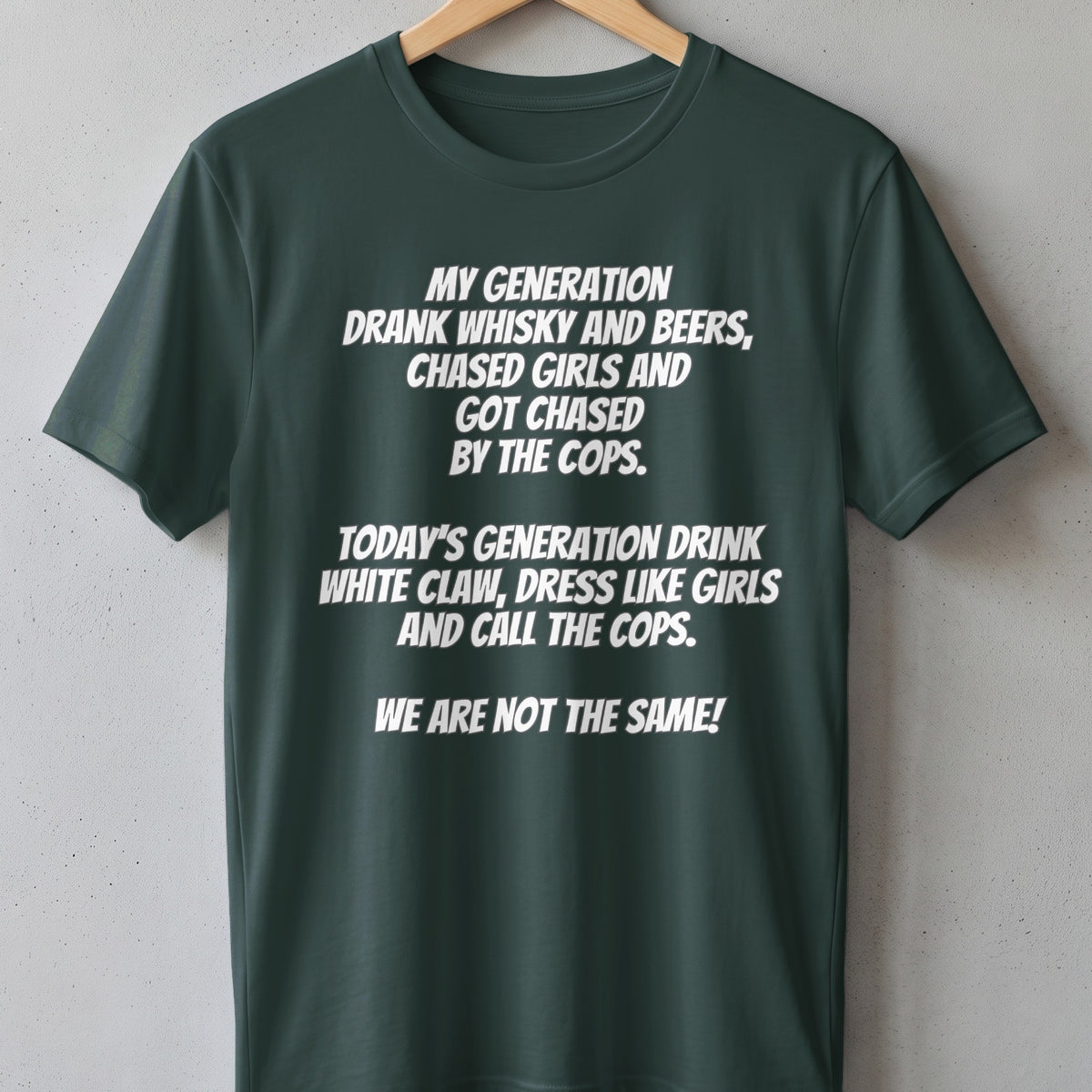 Dark green t-shirt with white text comparing generations' pastimes and actions.
