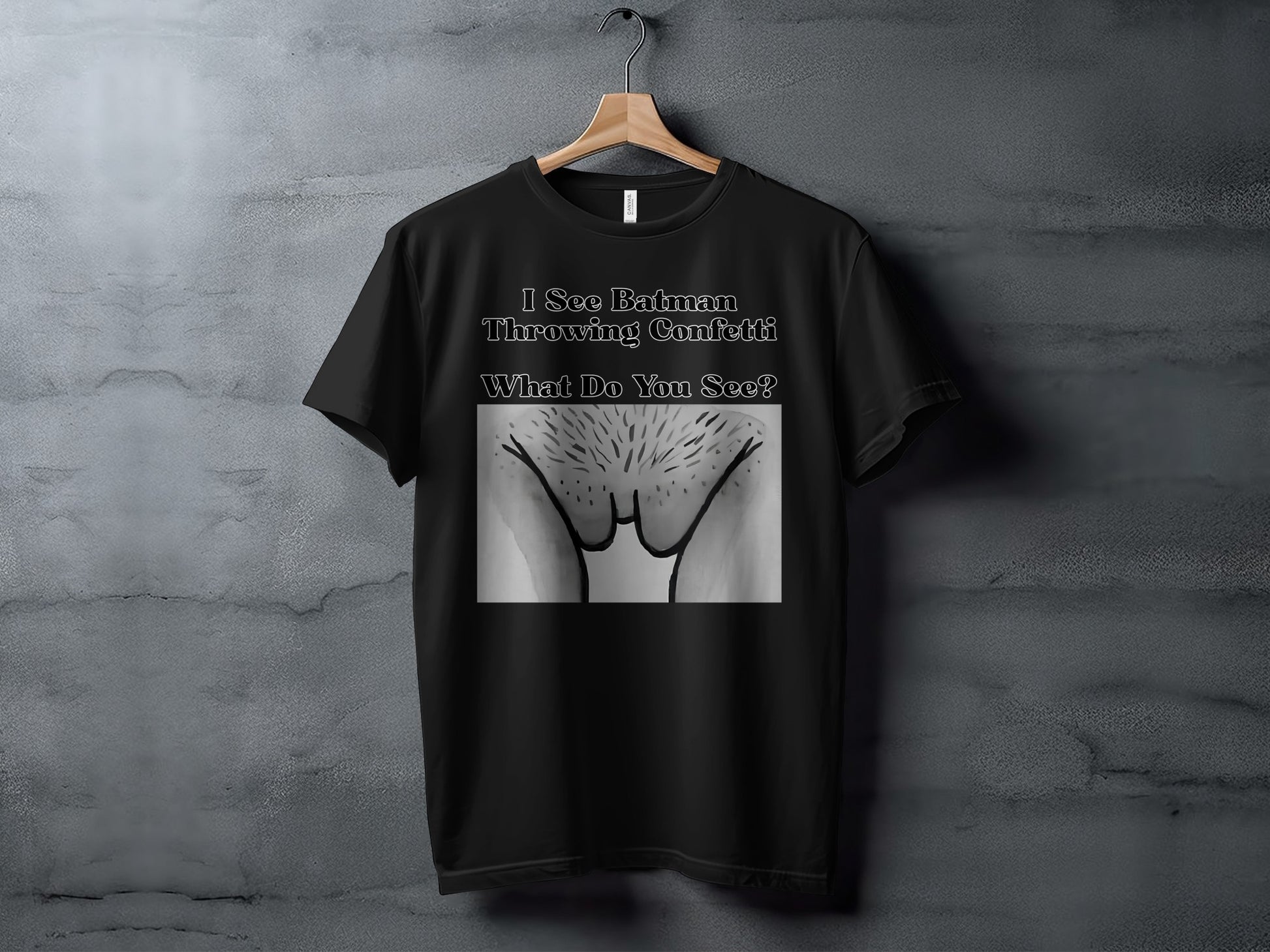 Black t-shirt with text "I See Batman Throwing Confetti What Do You See?" and image.