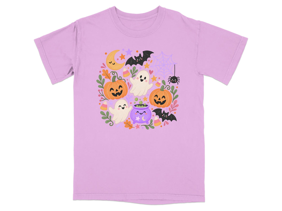 Lavender t-shirt with a Halloween-themed graphic featuring pumpkins, ghosts, bats, and a cauldron.