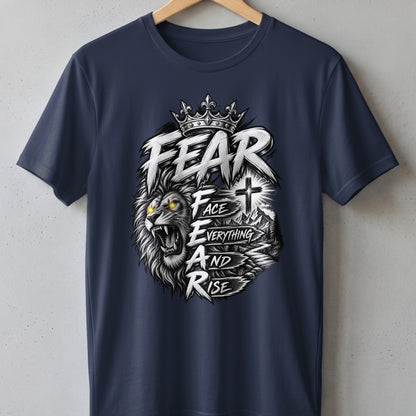 Navy t-shirt with a roaring lion, crown, cross, and text: "FEAR FACE EVERYTHING AND RISE".