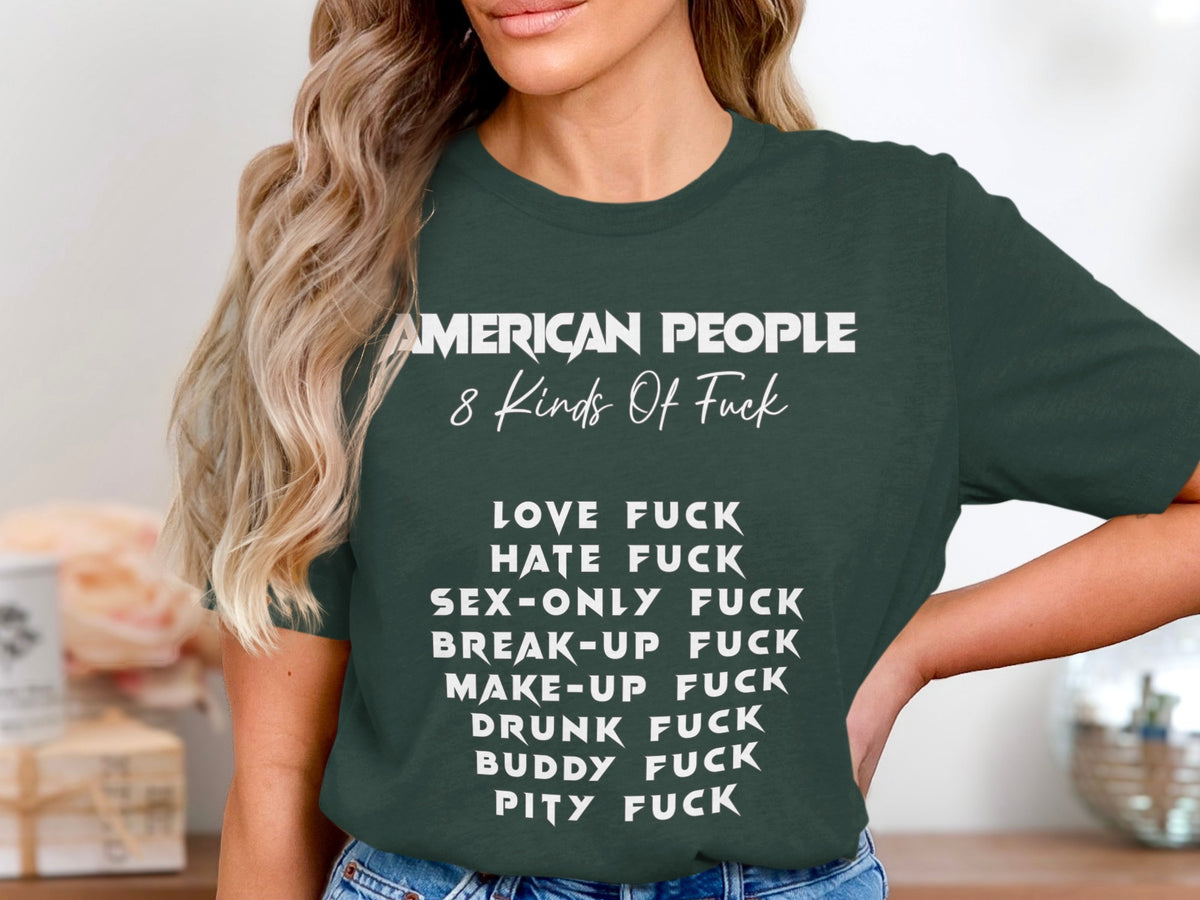 Green t-shirt with white text listing "AMERICAN PEOPLE 8 Kinds Of Fuck" and various types of fuck.