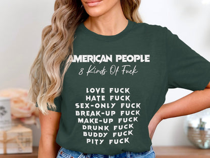 Green t-shirt with white text listing "AMERICAN PEOPLE 8 Kinds Of Fuck" and various types of fuck.