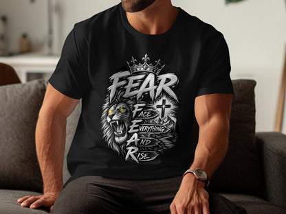 Black t-shirt with a lion, crown, cross, and text: Fear Everything and Rise.