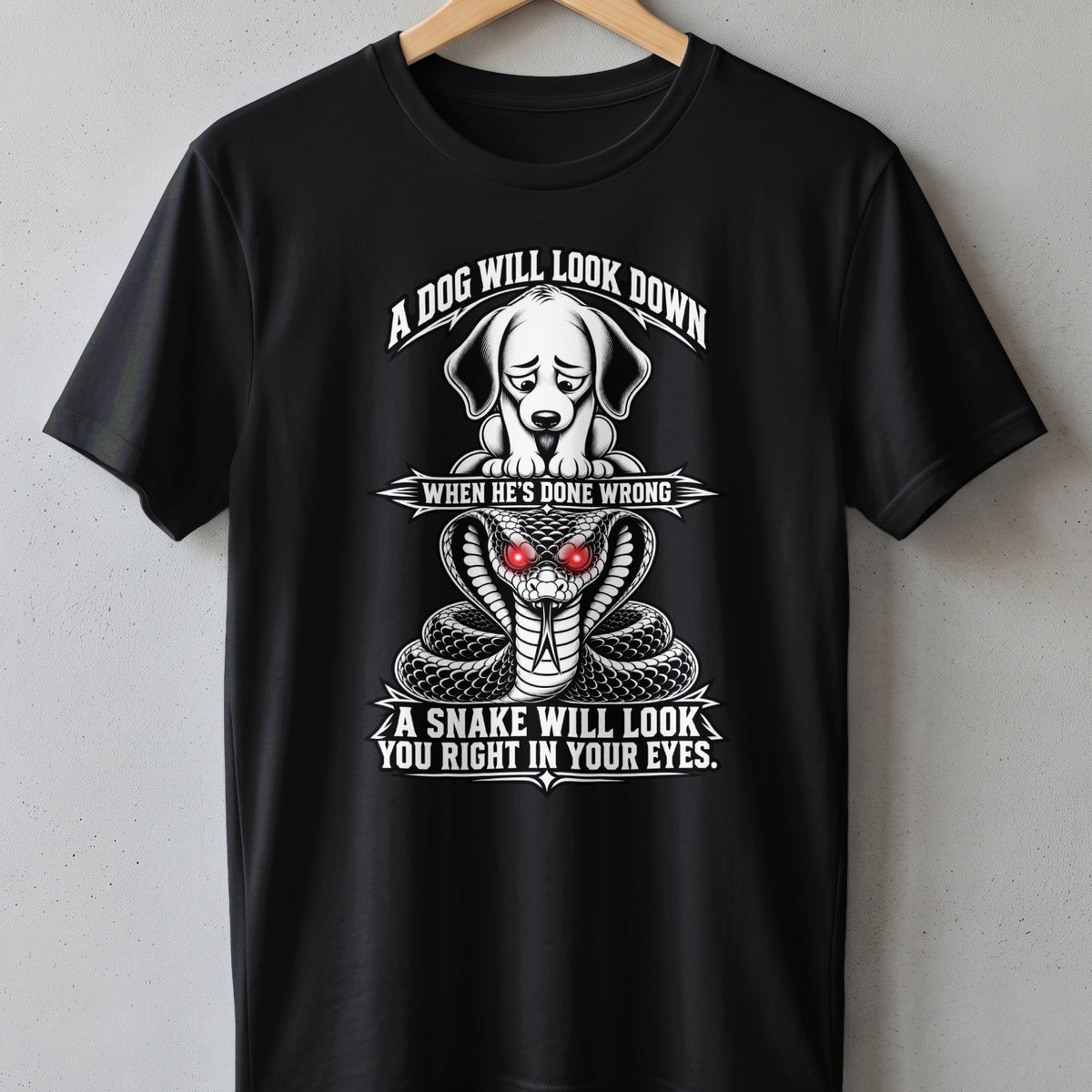 Black t-shirt with a dog and snake graphic. Text reads "A dog will look down when he's done wrong. A snake will look you right in your eyes."