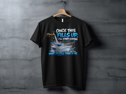 Black t-shirt with graphic: faucet filling shopping cart, "Once this fills up, I'll start caring what people think of me."