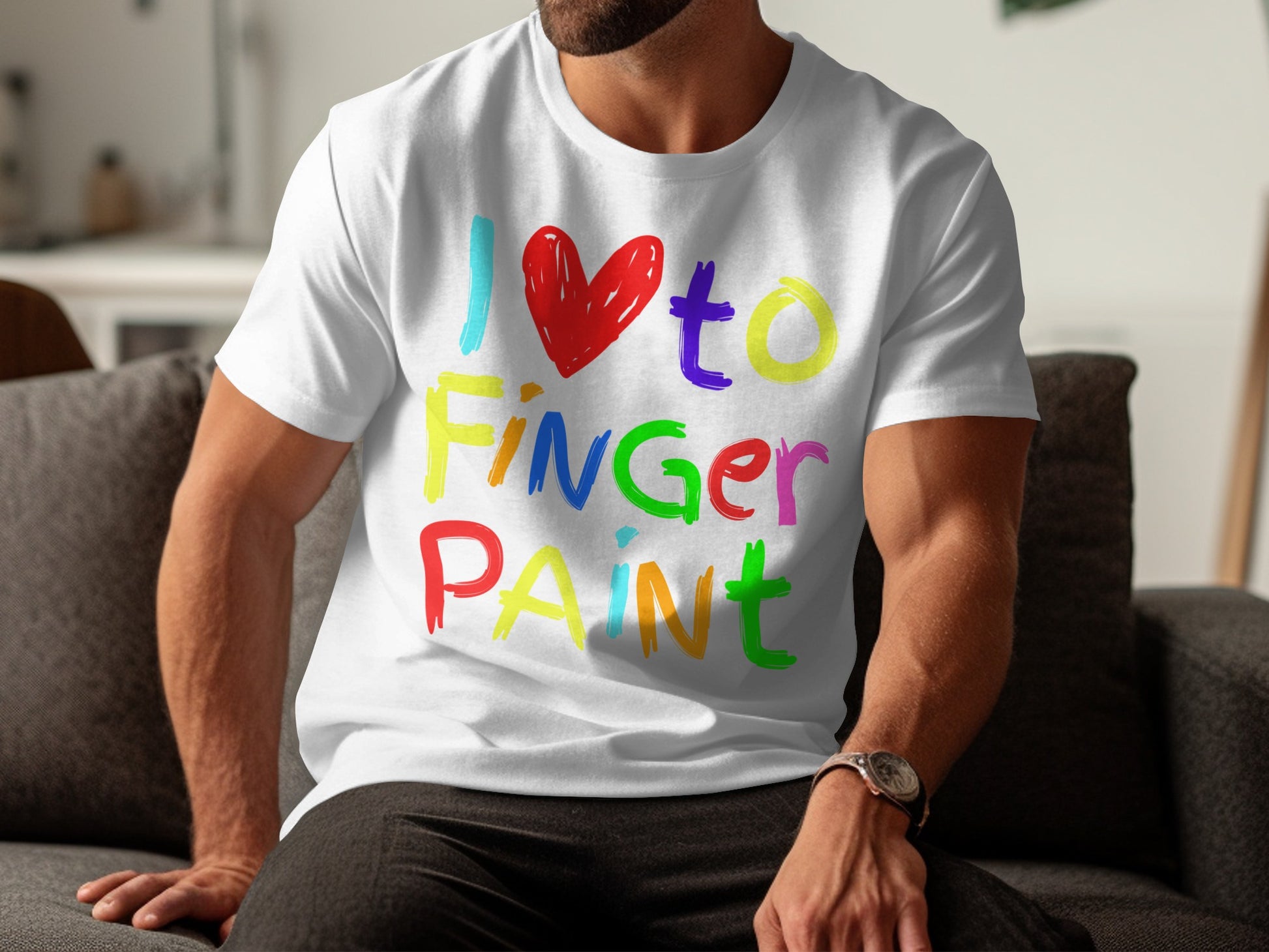 White t-shirt with colorful text reading "I ❤️ to FINGER PAINT".
