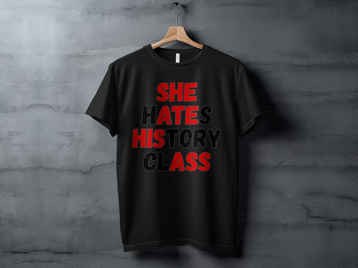 Black t-shirt with red and gray text reading "SHE HATES HISTORY CLASS".