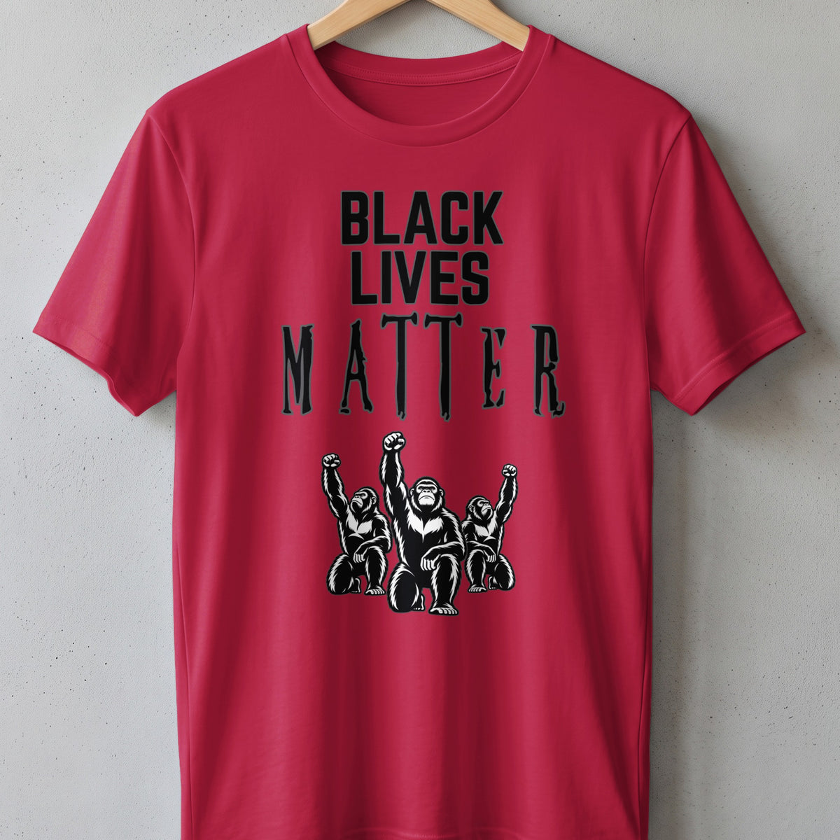 Red t-shirt with black text "BLACK LIVES MATTER" and three apes with raised fists.