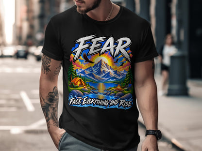 Black t-shirt with "FEAR FACE EVERYTHING AND RISE" graphic featuring a mountain landscape.