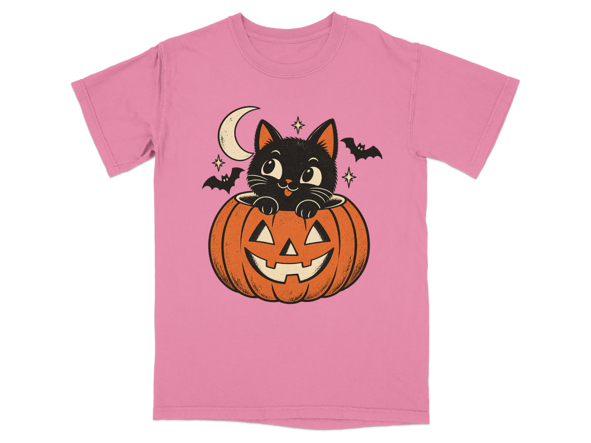 Pink t-shirt with black cat in a jack-o-lantern, moon, and bats.