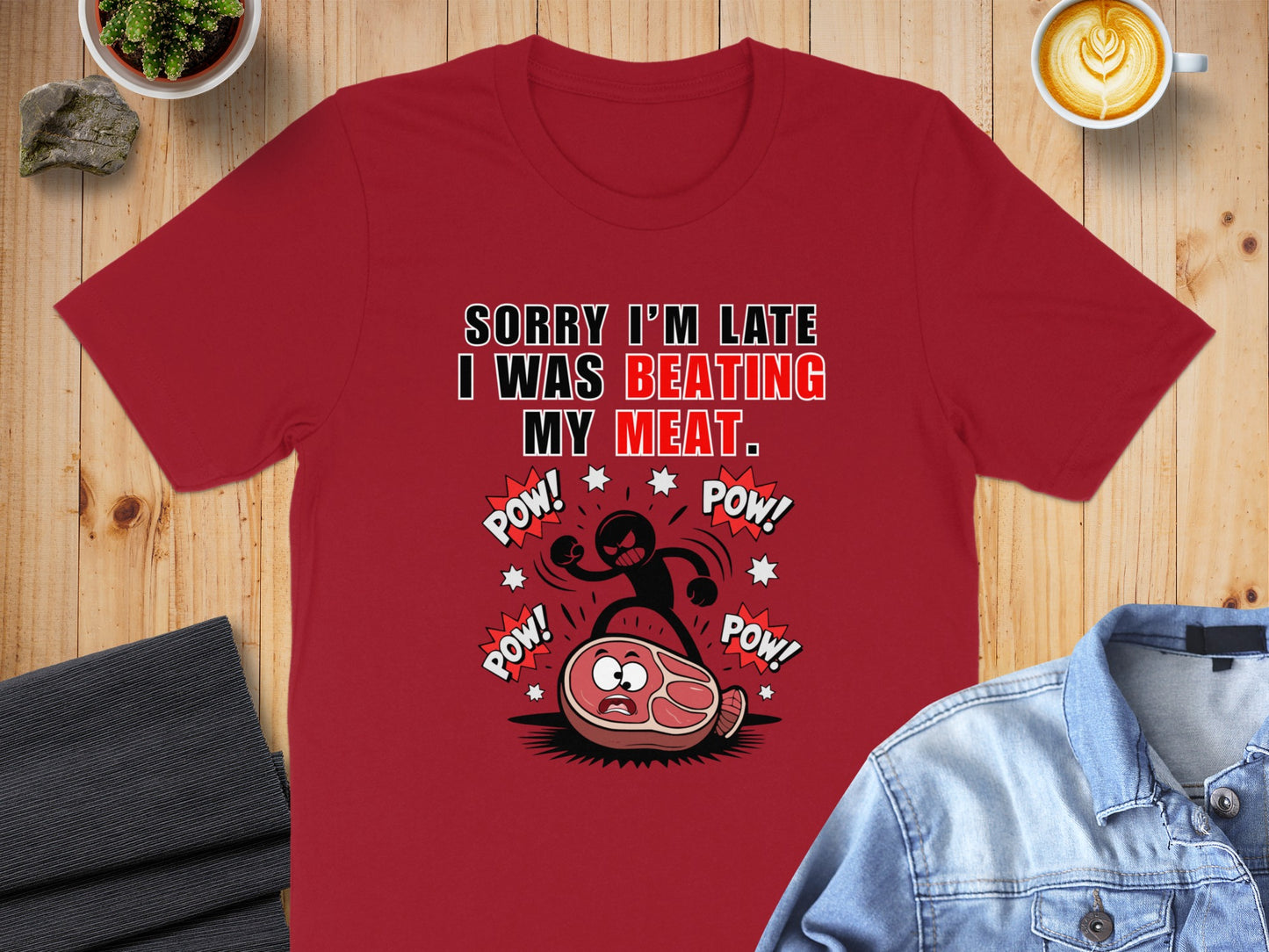 Red t-shirt with "SORRY I'M LATE I WAS BEATING MY MEAT." text and cartoon.
