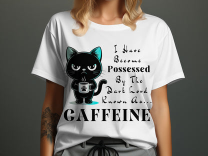 T-shirt with a cartoon black cat holding a coffee cup and the text "I Have Become Possessed By The Dark Lord Known As... CAFFEINE".