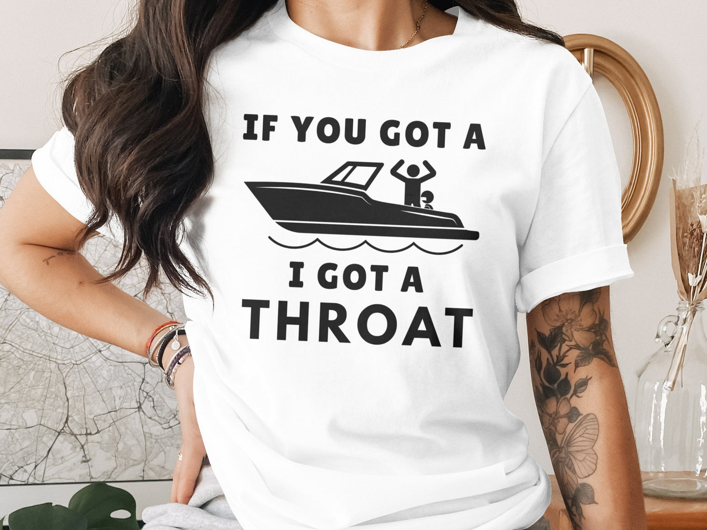 White t-shirt with black text and boat graphic: "IF YOU GOT A BOAT I GOT A THROAT".
