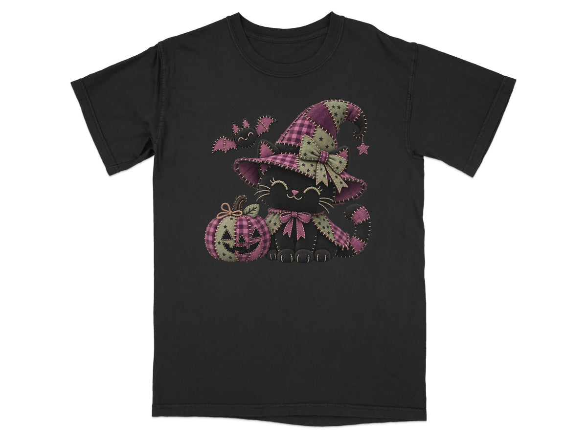 Black t-shirt with a patchwork Halloween cat wearing a witch hat and bow.