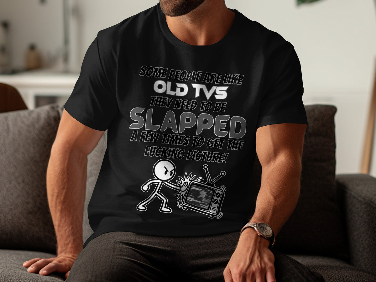 Black t-shirt with graphic: stick figure slapping an old TV that says "Some people are like old TVs."