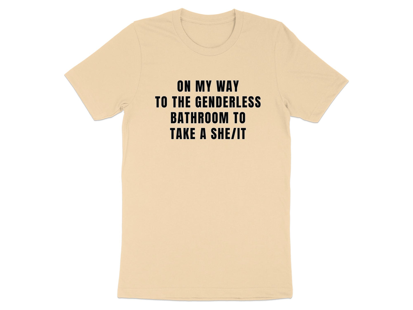 Peach t-shirt with black text reading "On my way to the genderless bathroom to take a she/it".