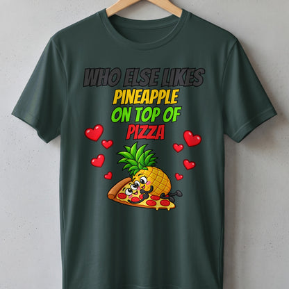 Dark green t-shirt with "Who Else Likes Pineapple On Top Of Pizza" text and cartoon pineapple and pizza.