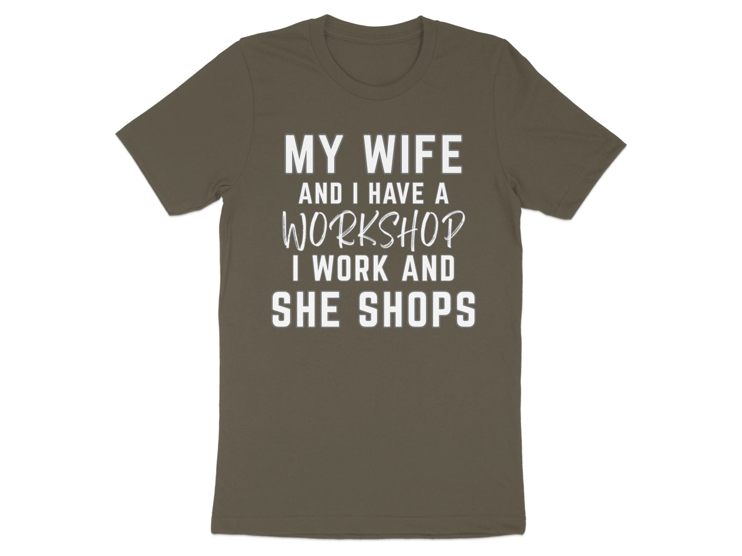 Brown t-shirt with white text "MY WIFE AND I HAVE A WORKSHOP I WORK AND SHE SHOPS".