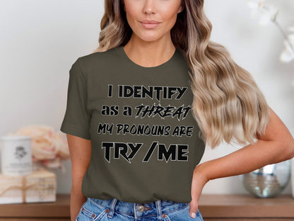 T-shirt with text "I IDENTIFY AS A THREAT MY PRONOUNS ARE TRY / ME".