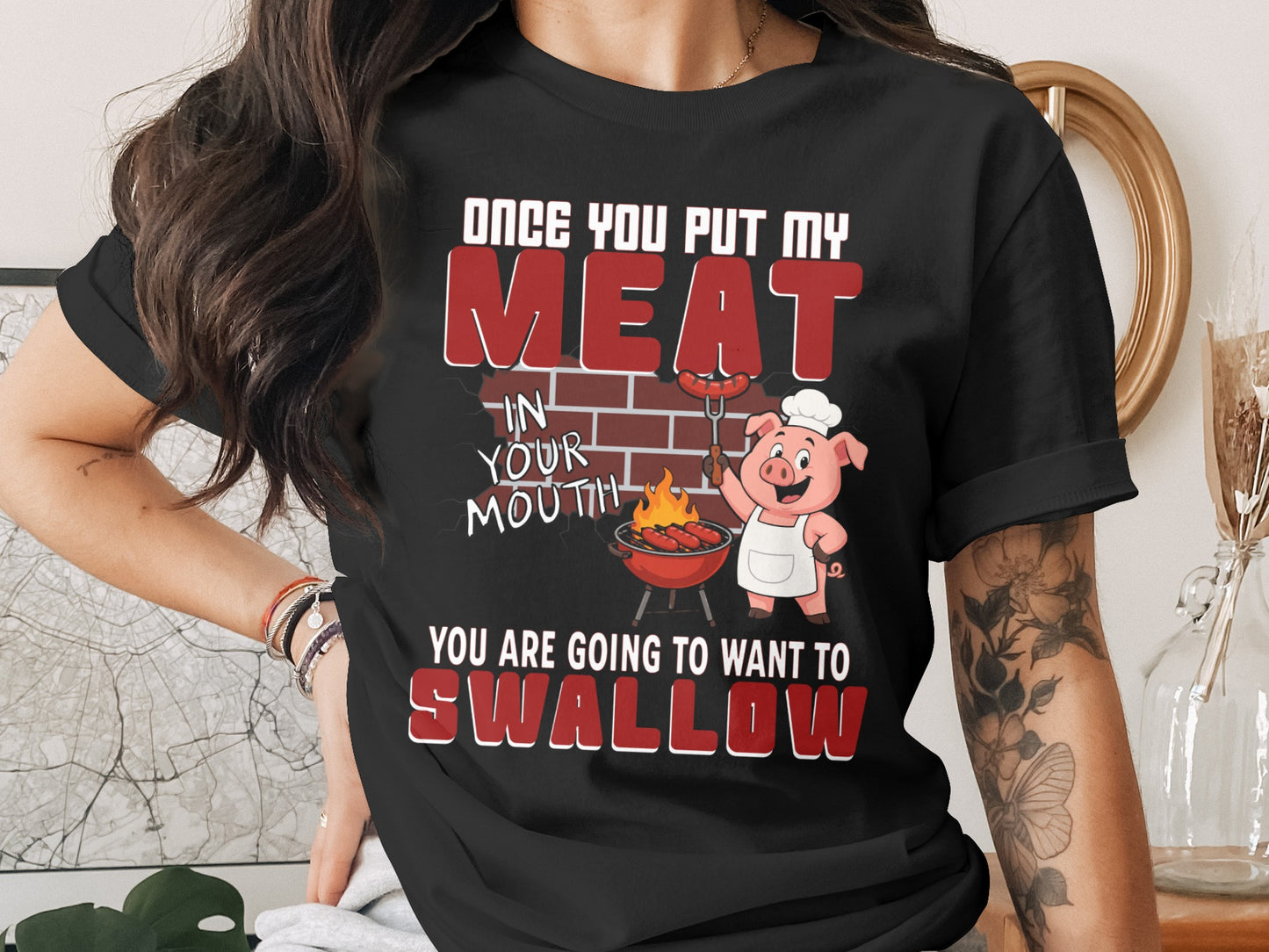 Black t-shirt with pig graphic and text "Once you put my meat in your mouth you are going to want to swallow".