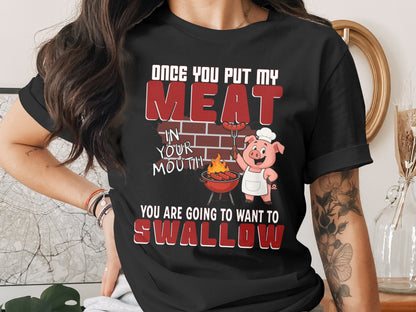 Black t-shirt with pig graphic and text "Once you put my meat in your mouth you are going to want to swallow".