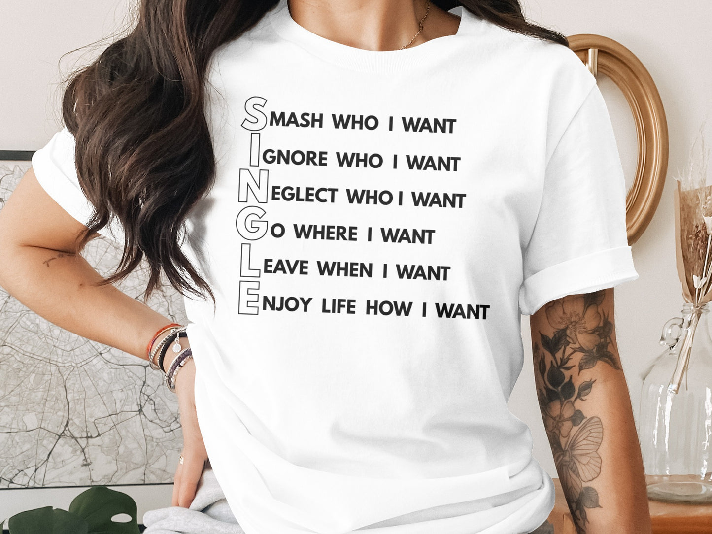 White t-shirt with "SINGLE" acronym and definition text.