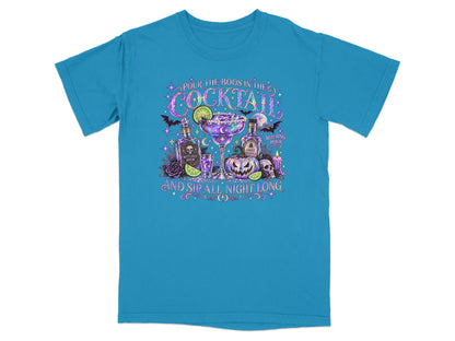 Teal t-shirt with "Pour the boos in the cocktail and sip all night long" text and Halloween graphics.